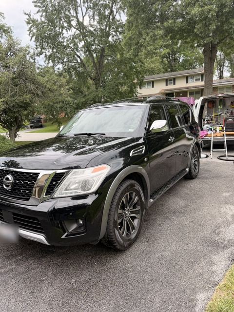 Black Nissan Armada with a deep gloss finish