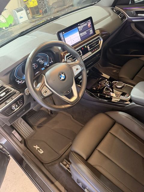 BMW X3 dashboard and front seats after a full interior detail