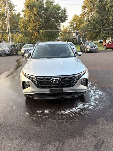 Silver Hyundai Tucson washed and rinsed at golden hour